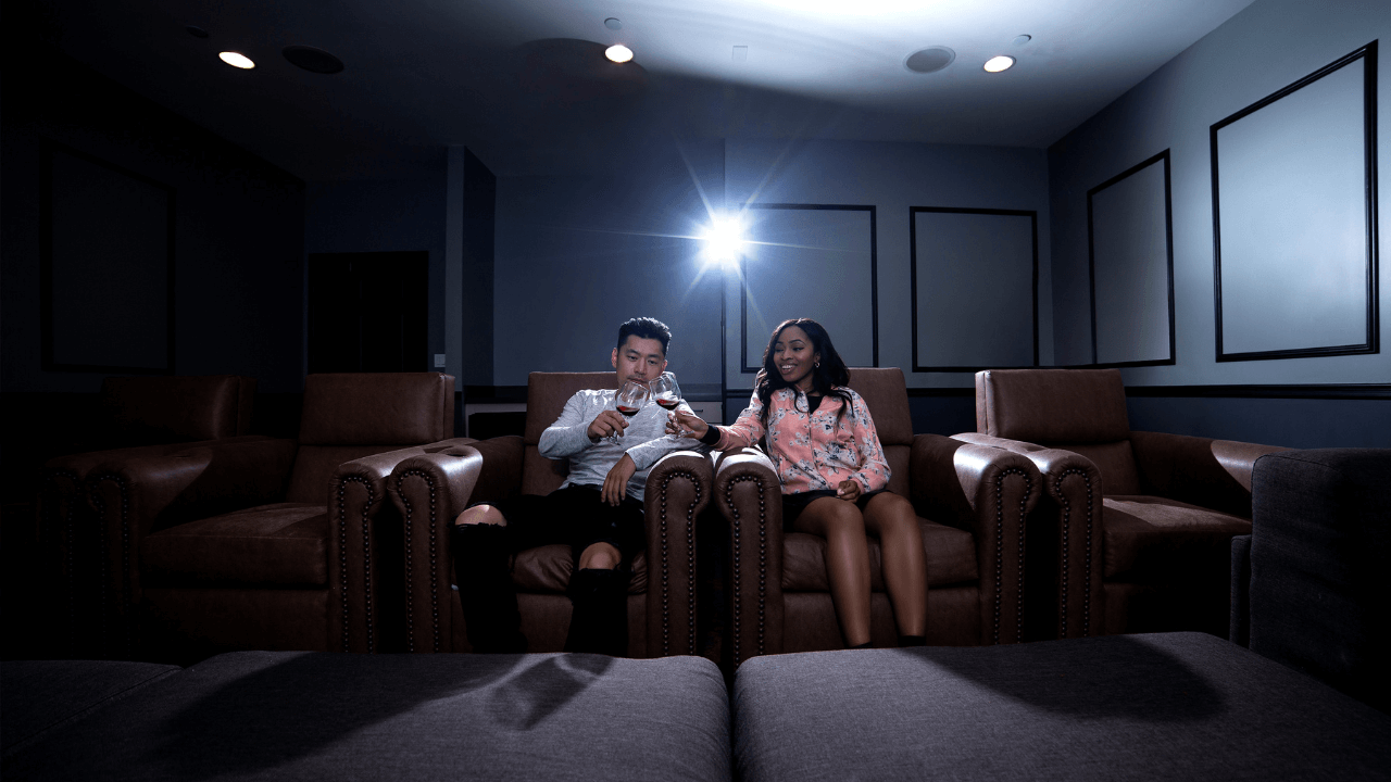 two people in a home theatre